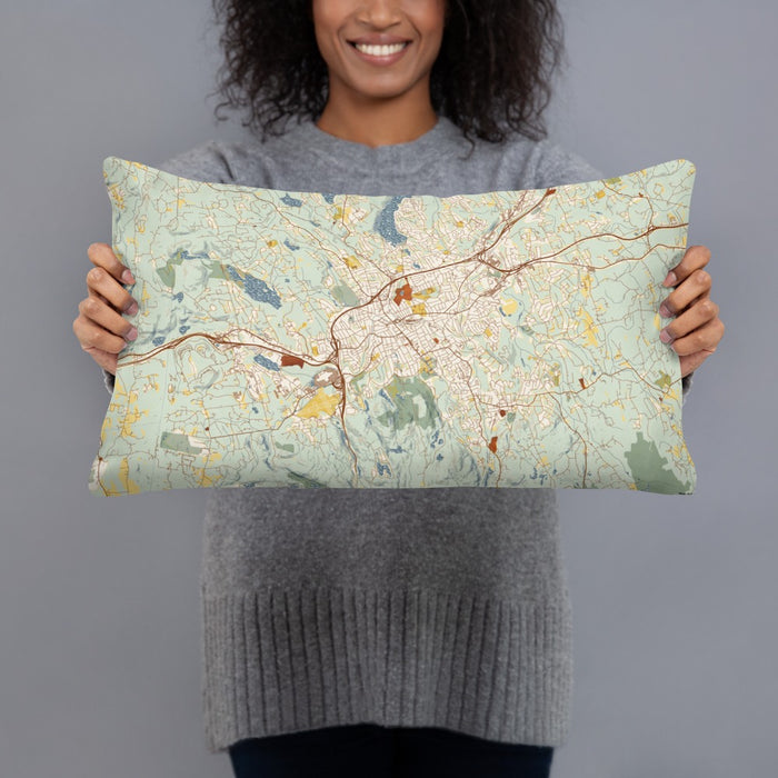 Person holding 20x12 Custom Danbury Connecticut Map Throw Pillow in Woodblock