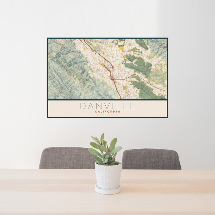 24x36 Danville California Map Print Landscape Orientation in Woodblock Style Behind 2 Chairs Table and Potted Plant