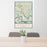 24x36 Darien Georgia Map Print Portrait Orientation in Woodblock Style Behind 2 Chairs Table and Potted Plant