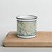 Front View Custom Darien Georgia Map Enamel Mug in Woodblock on Cutting Board