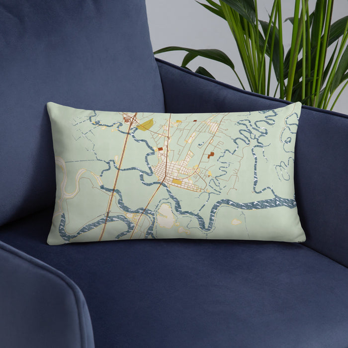 Custom Darien Georgia Map Throw Pillow in Woodblock on Blue Colored Chair