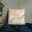 Custom Davenport Iowa Map Throw Pillow in Watercolor on Bedding Against Wall