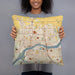 Person holding 18x18 Custom Davenport Iowa Map Throw Pillow in Woodblock