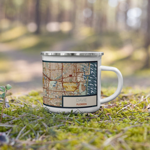 Right View Custom Davie Florida Map Enamel Mug in Woodblock on Grass With Trees in Background