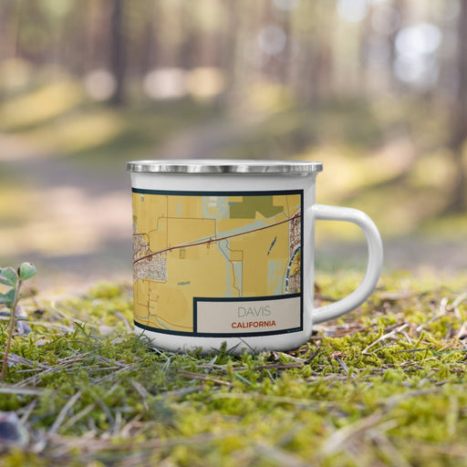 Right View Custom Davis California Map Enamel Mug in Woodblock on Grass With Trees in Background