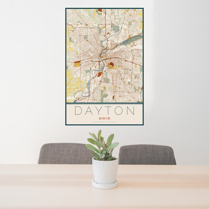 24x36 Dayton Ohio Map Print Portrait Orientation in Woodblock Style Behind 2 Chairs Table and Potted Plant
