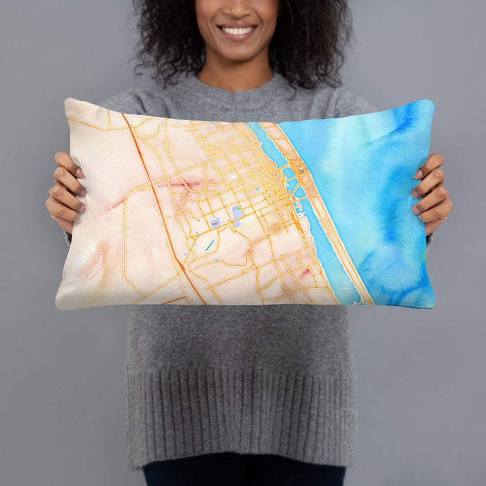 Person holding 20x12 Custom Daytona Beach Florida Map Throw Pillow in Watercolor