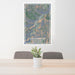 24x36 Deadwood South Dakota Map Print Portrait Orientation in Afternoon Style Behind 2 Chairs Table and Potted Plant