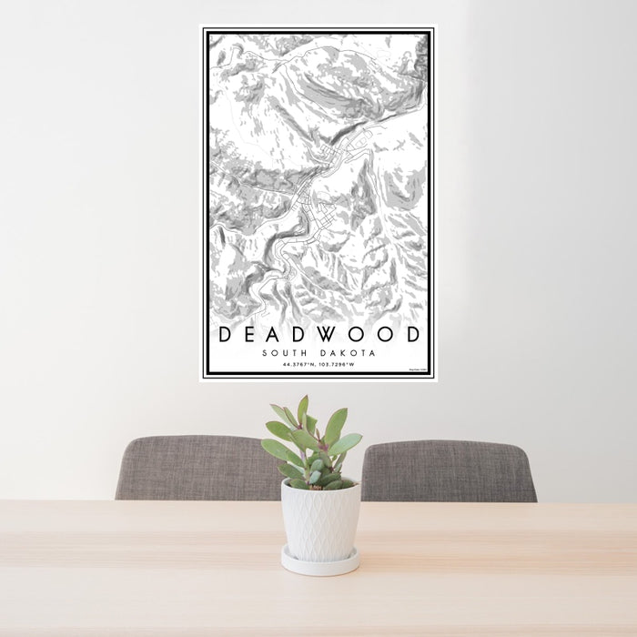 24x36 Deadwood South Dakota Map Print Portrait Orientation in Classic Style Behind 2 Chairs Table and Potted Plant