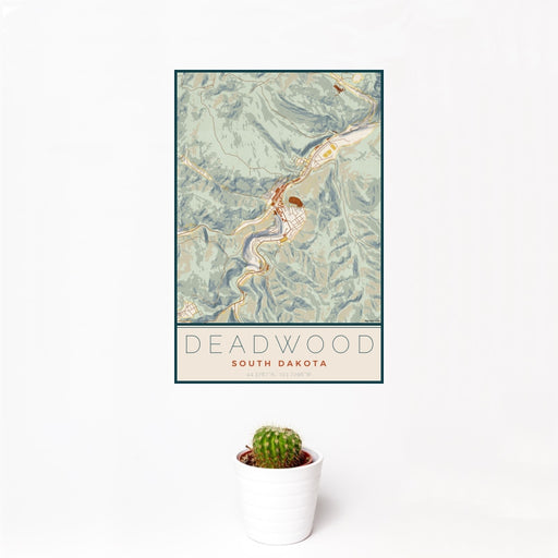 12x18 Deadwood South Dakota Map Print Portrait Orientation in Woodblock Style With Small Cactus Plant in White Planter