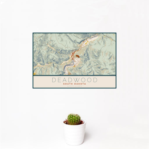 12x18 Deadwood South Dakota Map Print Landscape Orientation in Woodblock Style With Small Cactus Plant in White Planter