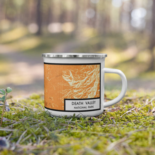 Right View Custom Death Valley National Park Map Enamel Mug in Ember on Grass With Trees in Background