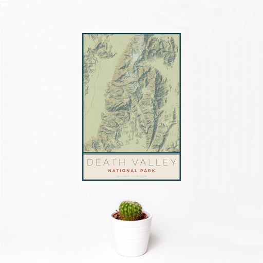 12x18 Death Valley National Park Map Print Portrait Orientation in Woodblock Style With Small Cactus Plant in White Planter
