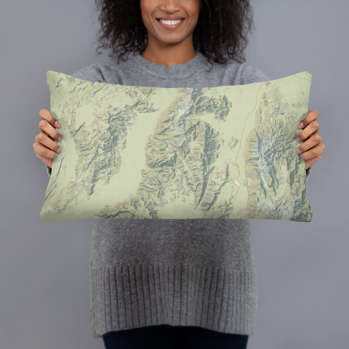 Person holding 20x12 Custom Death Valley National Park Map Throw Pillow in Woodblock