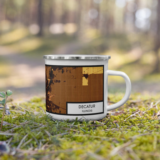 Right View Custom Decatur Illinois Map Enamel Mug in Ember on Grass With Trees in Background