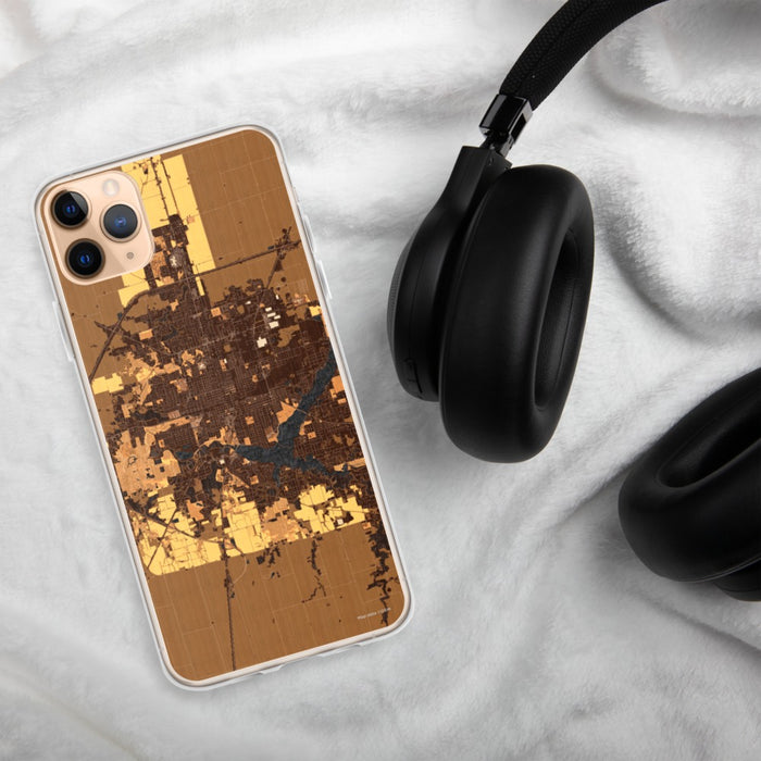 Custom Decatur Illinois Map Phone Case in Ember on Table with Black Headphones