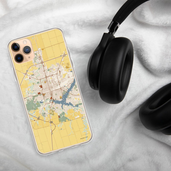 Custom Decatur Illinois Map Phone Case in Woodblock on Table with Black Headphones