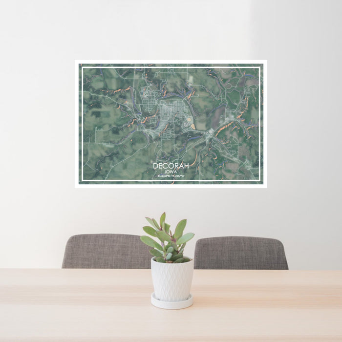 24x36 Decorah Iowa Map Print Lanscape Orientation in Afternoon Style Behind 2 Chairs Table and Potted Plant