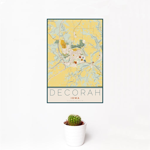 12x18 Decorah Iowa Map Print Portrait Orientation in Woodblock Style With Small Cactus Plant in White Planter