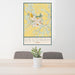 24x36 Decorah Iowa Map Print Portrait Orientation in Woodblock Style Behind 2 Chairs Table and Potted Plant
