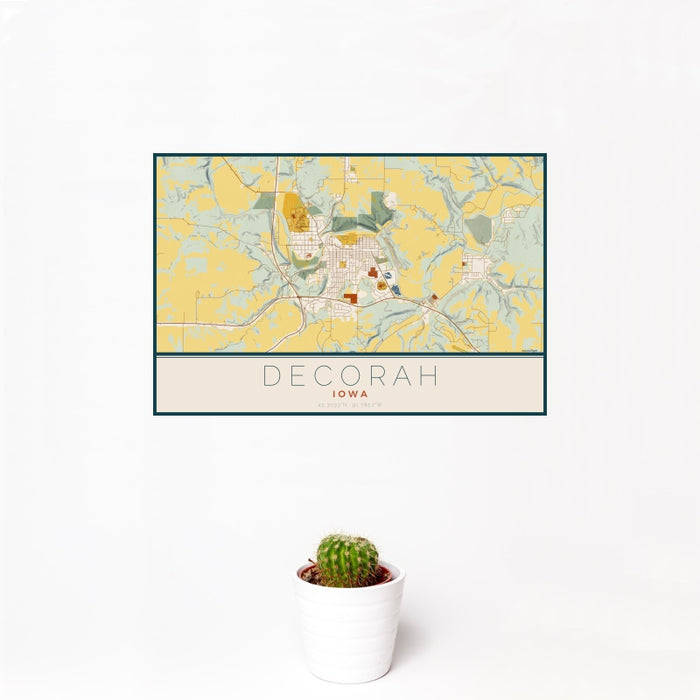 12x18 Decorah Iowa Map Print Landscape Orientation in Woodblock Style With Small Cactus Plant in White Planter