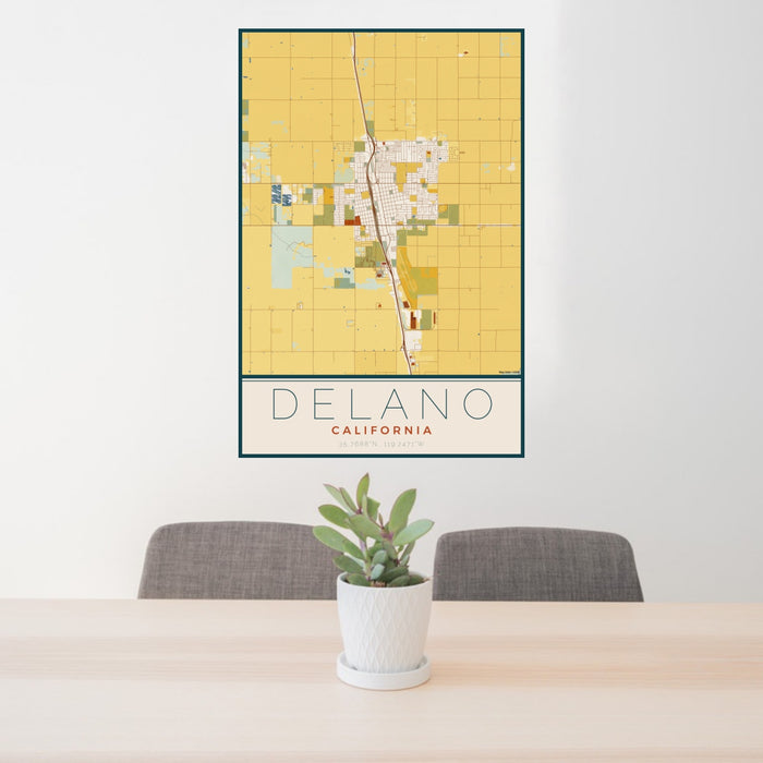 24x36 Delano California Map Print Portrait Orientation in Woodblock Style Behind 2 Chairs Table and Potted Plant