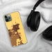 Custom Delano California Map Phone Case in Ember on Table with Black Headphones