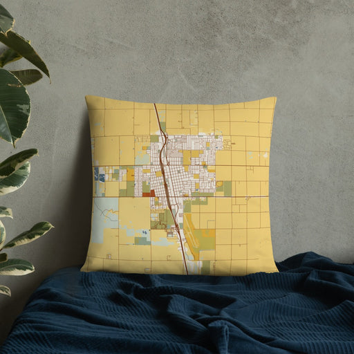 Custom Delano California Map Throw Pillow in Woodblock on Bedding Against Wall