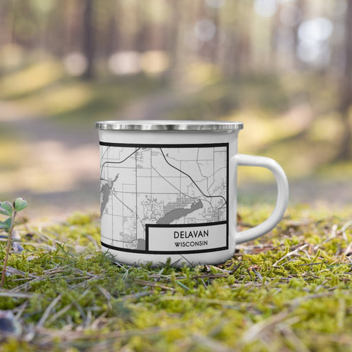 Right View Custom Delavan Wisconsin Map Enamel Mug in Classic on Grass With Trees in Background