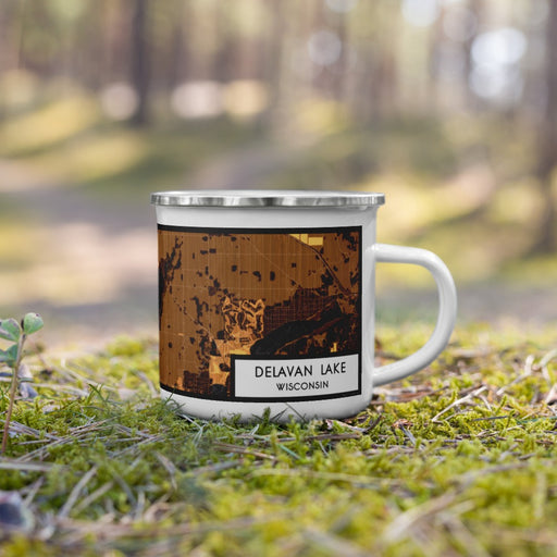 Right View Custom Delavan Lake Wisconsin Map Enamel Mug in Ember on Grass With Trees in Background