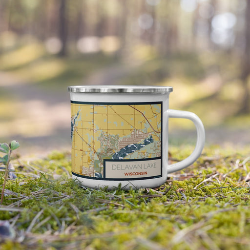 Right View Custom Delavan Lake Wisconsin Map Enamel Mug in Woodblock on Grass With Trees in Background