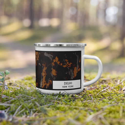 Right View Custom Delhi New York Map Enamel Mug in Ember on Grass With Trees in Background