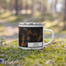 Right View Custom Delhi New York Map Enamel Mug in Ember on Grass With Trees in Background