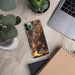 Custom Delhi New York Map Phone Case in Ember on Table with Laptop and Plant