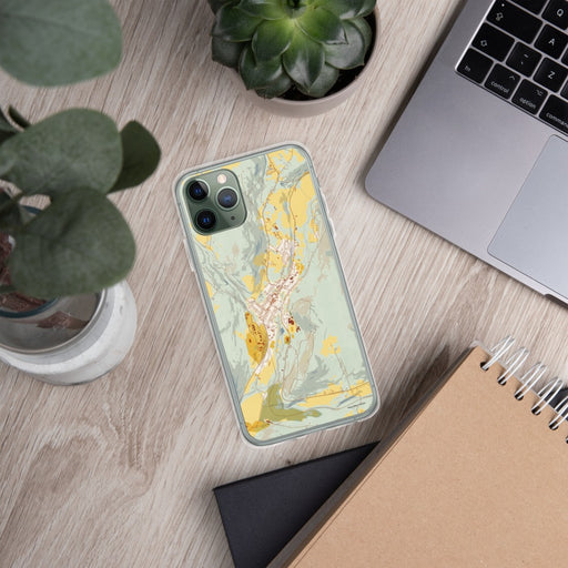 Custom Delhi New York Map Phone Case in Woodblock on Table with Laptop and Plant