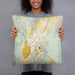 Person holding 18x18 Custom Delhi New York Map Throw Pillow in Woodblock