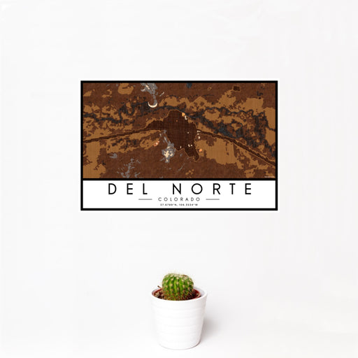 12x18 Del Norte Colorado Map Print Landscape Orientation in Ember Style With Small Cactus Plant in White Planter