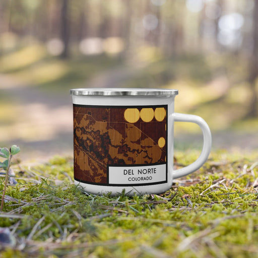 Right View Custom Del Norte Colorado Map Enamel Mug in Ember on Grass With Trees in Background
