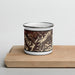Front View Custom Denali National Park Map Enamel Mug in Ember on Cutting Board