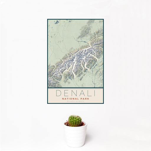 12x18 Denali National Park Map Print Portrait Orientation in Woodblock Style With Small Cactus Plant in White Planter