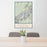 24x36 Denali National Park Map Print Portrait Orientation in Woodblock Style Behind 2 Chairs Table and Potted Plant