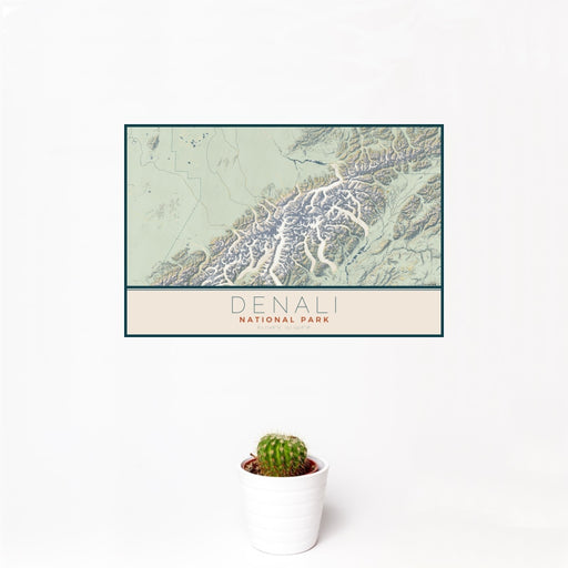 12x18 Denali National Park Map Print Landscape Orientation in Woodblock Style With Small Cactus Plant in White Planter