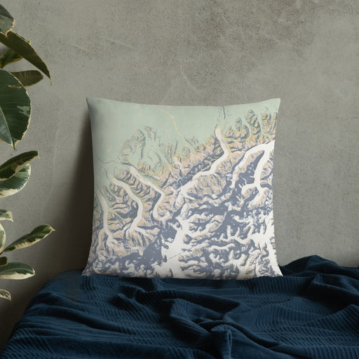Custom Denali National Park Map Throw Pillow in Woodblock on Bedding Against Wall