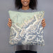 Person holding 18x18 Custom Denali National Park Map Throw Pillow in Woodblock