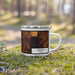 Right View Custom Denton Texas Map Enamel Mug in Ember on Grass With Trees in Background