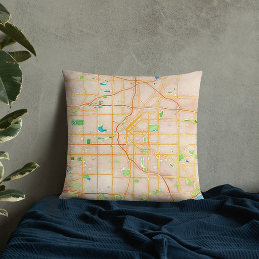 Custom Denver Colorado Map Throw Pillow in Watercolor on Bedding Against Wall