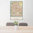 24x36 Denver Colorado Map Print Portrait Orientation in Woodblock Style Behind 2 Chairs Table and Potted Plant