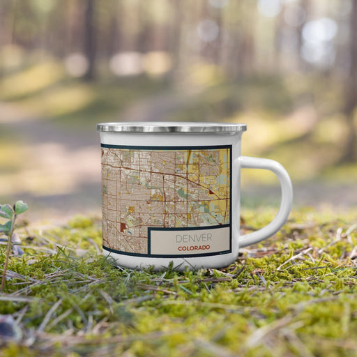 Right View Custom Denver Colorado Map Enamel Mug in Woodblock on Grass With Trees in Background