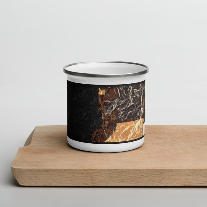 Front View Custom Depoe Bay Oregon Map Enamel Mug in Ember on Cutting Board