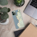 Custom Depoe Bay Oregon Map Phone Case in Woodblock on Table with Laptop and Plant